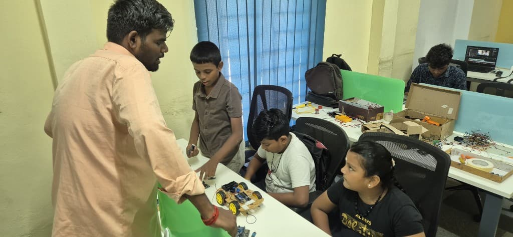 Robotics training session with instructor and students