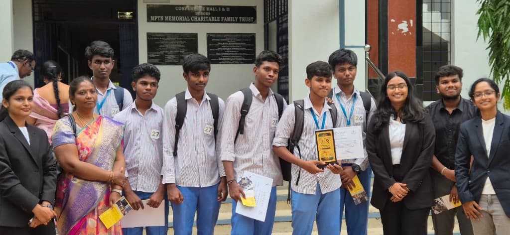 Students receiving award at partner institution